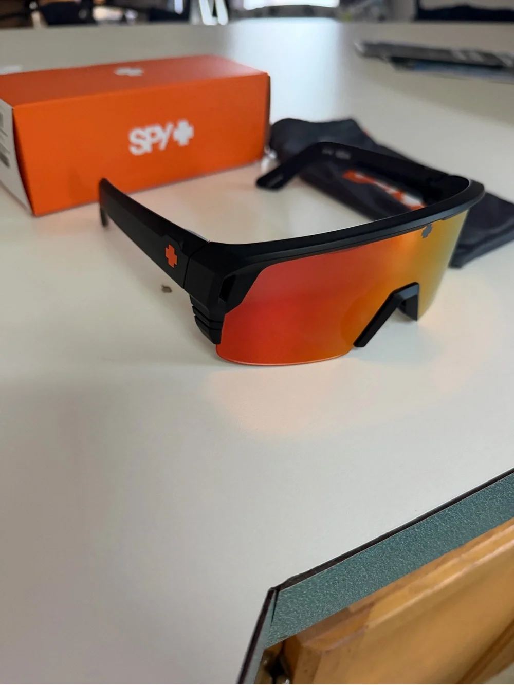 SPY Black Sunglasses with Orange-Red Mirrored Lens